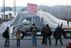 protesters halt operations at some western ports