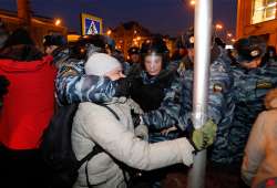 riot police break up anti putin protest in moscow