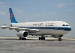 terror threat forces plane to land in china