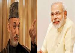 will protect indian missions karzai tells modi