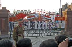 60 hindu families flee pakistan to arrive at wagah