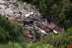 12 dead as bus with students falls off albania cliff