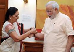 anandiben patel ties rakhi on narendra modi s wrist see pics