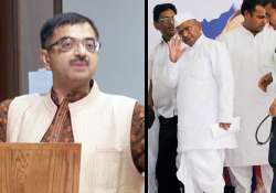 bjp attacks anna over bhushan father son in panel