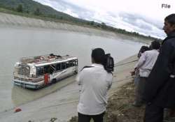 two killed over 40 feared drowned as bus falls into canal