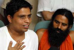 cbi files charge sheet against ramdev s aide balkrishna