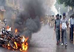 car bus bridge set ablaze in assam