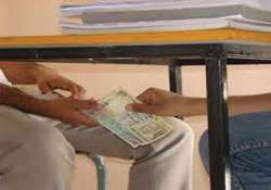 cop and village official caught red handed accepting bribes