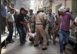 curfew in haryana town after communal violence