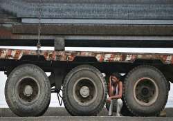 cyclone phailin evacuated people taking shelter inside parked trucks in paradip