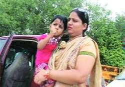 delhi traffic police crane tows away car with baby sleeping inside