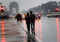 delhi temperature dips with rain