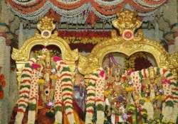 devotees throng meenakshi temple for celestial wedding