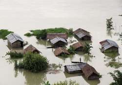 flood fury continues in assam nearly one lakh people hit