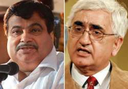 gadkari demands khursheed s expulsion from cabinet