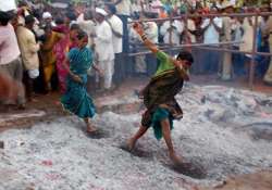 gujarat tribals walk ember to mark holi festival