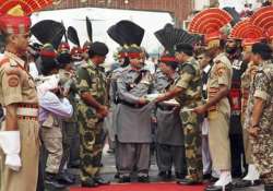 india pakistan border guards exchange sweets on eid