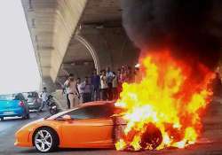 lamborghini catches fire driver escapes unhurt