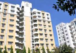 not handing 4 flats realty firm asked to pay rs 4.55 l each