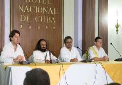 sri sri convinces farc to adopt gandhian principle of non violence