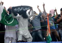 youths wave pakistan is flags clashes with police