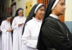 nun with headgear not allowed to write pmt exam