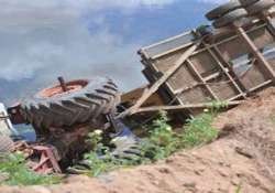 four killed 10 hurt after tractor trolley overturns