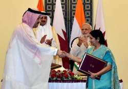 india qatar ink six pacts discuss energy during emir s visit