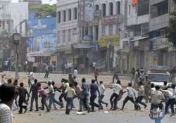 clashes in kanpur over torn religious poster