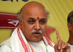 will welcome those ready to return to hindu fold togadia