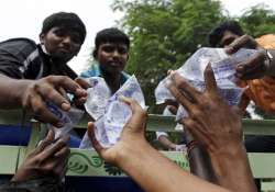 chennai floods long queues at atms petrol pumps