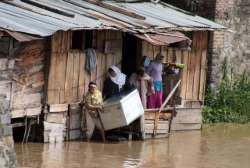 residents pool in money hire jcb to tackle flood waters