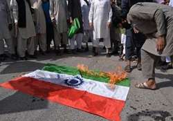 protesters burn indian flag in pok against crackdown on separatists