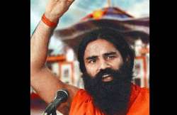 swami ramdev warns of conspiracy to defame hindu saints