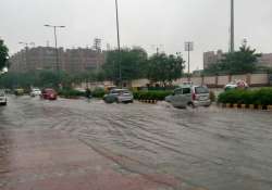 in pics live water logging due to heavy rainfall throws life out of gear in delhi