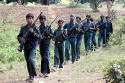 chhattisgarh s new strategies fructify as 200 naxals surrender