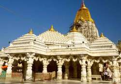 gujarat s famous ambaji temple receives 1.25 kg of gold for plating its spire