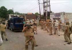 army stages flag march in samba 14 injured in clashes