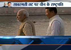 pm modi and president xi walk along sabarmati riverfront