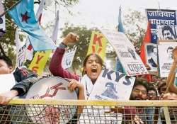 students stage protest outside police headquarters against cop attack on protestors