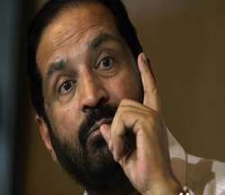 pm warns wrongdoers as kalmadi points finger at sports ministry