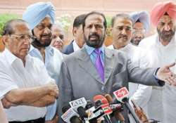 kalmadi sacked malhotra named ioa acting president