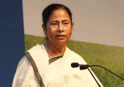 mamata banerjee back from singapore terms visit turning point for wb