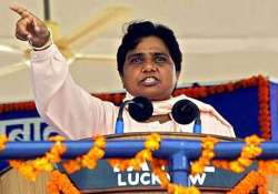 mayawati lashes out at bjp over booklet on fake scams