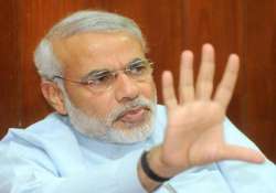 modi takes up mumbai housing society s issue with maharashtra cm