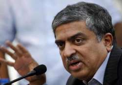 nandan nilekani promises to meet 60 cr aadhar target by 2014