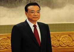 new chinese pm speaks to manmohan singh