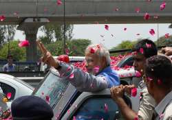 prime minister designate modi gets grand welcome at airport