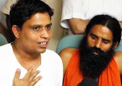 ramdev s aide heads 34 firms worth rs265 crore