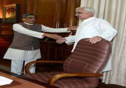 salman khurshid takes charge as external affairs minister